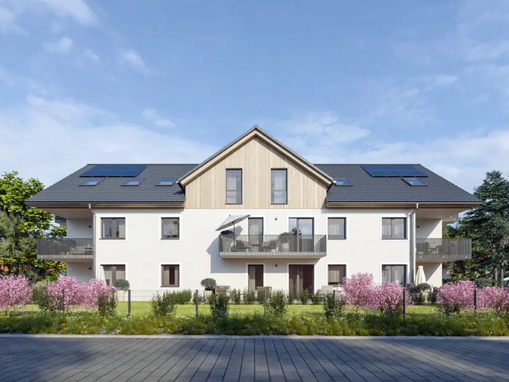 Südansicht des SCHORENBACH HOF in Buchloe-Honsolgen – barrierefreie Wohnungen mit Aufzug, Terrasse und Gemeinschaftsgarten in naturnaher Umgebung