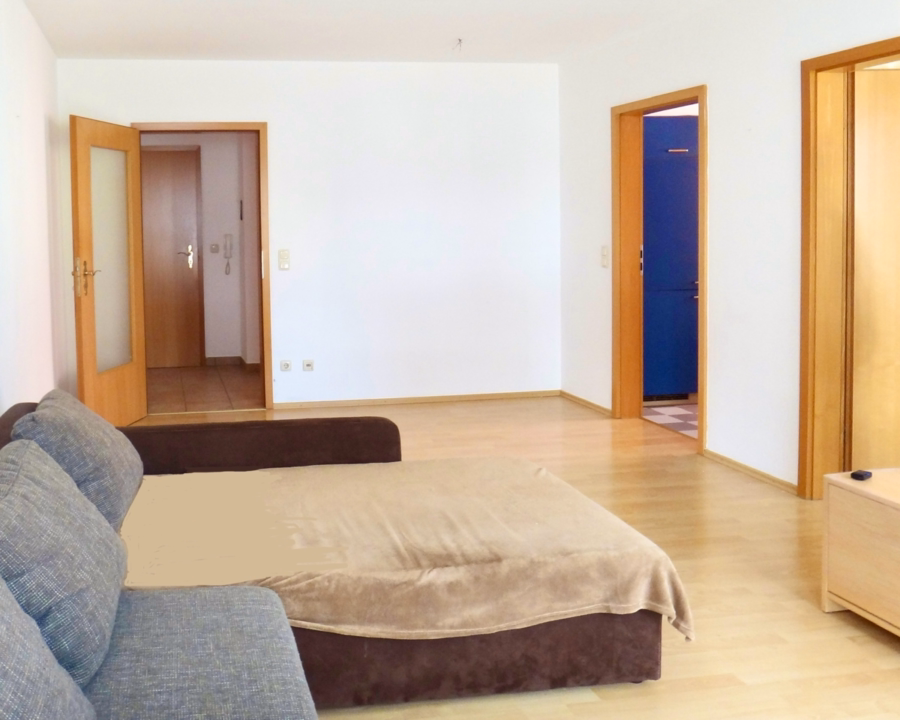Wohnzimmer - ZENTRAL GELEGENE 2-ZIMMER-WOHNUNG MIT PERFEKTEM GRUNDRISS