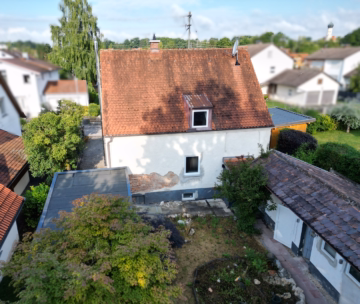 Außenansicht - Sonniges Grundstück mit Altbestand in ruhiger Lage – Entwickeln Sie Ihr Bauprojekt!