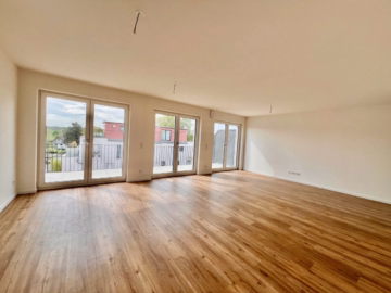 Wohn- und Essraum - Attraktives Wohlfühlen in energieeffizientem Neubau als Erstbezug mit EBK, ablösefrei