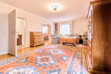 Wohnzimmer - Ein Haus, das berührt – großzügiges Wohnen mit Gartenidylle und stilvollem Anbau